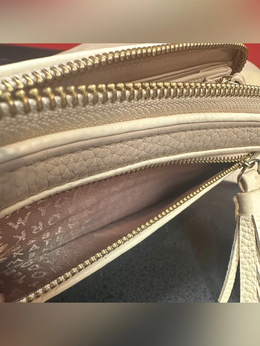 Kate Spade Zip Around Tan/Cream Wallet Tassel Accent Lots of Storage